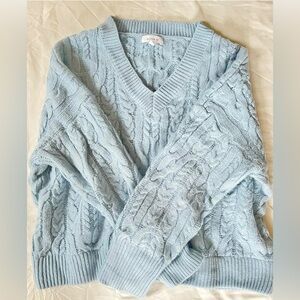 Women’s cable knit drop shoulder sweater